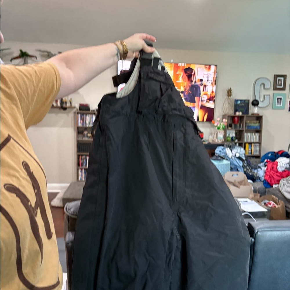 Sleek Black Ski & Snowboard Jumpsuit for Ultimate Performance